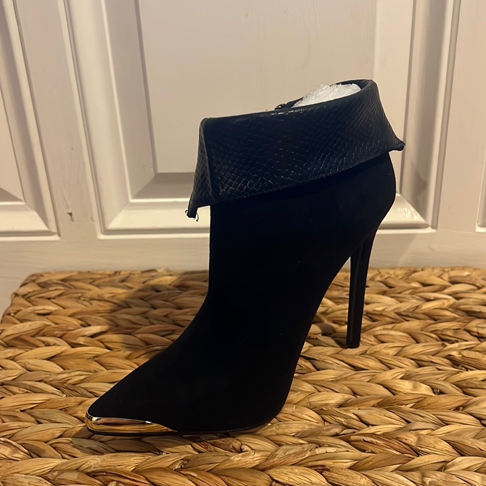 Suede ankle bootie with gold embellishments